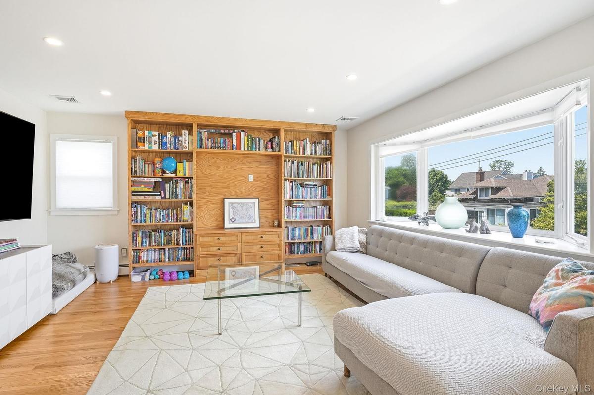 Livigg Room with Picture Window and Built-Ins