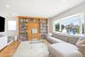 Livigg Room with Picture Window and Built-Ins