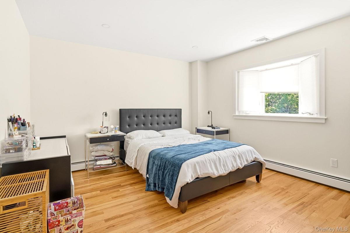 Primary Bedroom with Walk-In Closet and Ensuite Bathroom