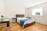 Primary Bedroom with Walk-In Closet and Ensuite Bathroom