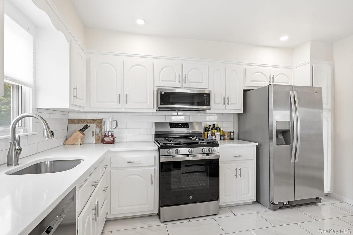 Renovated Kitchen with Stainless Appliances