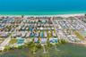 Aerial – Gulf Side OverviewAerial view showcasing proximity to the Gulf of Mexico and surrounding beachside homes.