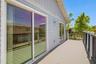 Deck View – Neighboring HomesElevated deck overlooking the surrounding neighborhood with coastal breezes and outdoor living space.Private elevated dec