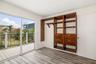 Bedroom with Deck AccessBedroom with direct sliding glass door access to the outdoor deck for indoor-outdoor living.