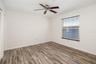 Secondary BedroomSecondary bedroom with natural light and ample space for guests or office use.