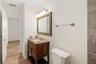 Bathroom VanityClean and functional bathroom vanity with storage and updated fixtures.