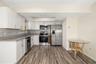 Kitchen – Extended ViewOpen kitchen design with ample counter space and seamless connection to dining and living areas.Open-concept kitchen with ample