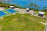 Nearby Park & Tennis CourtsNearby green space with tennis courts and shaded areas for outdoor recreation.
