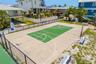Community basketball court offering additional outdoor recreation just moments from the home.