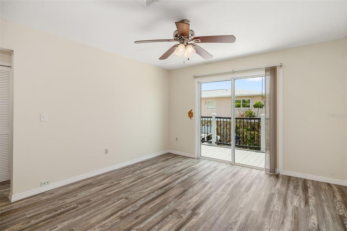 Living Area – Wide Open ViewSpacious open-concept living area with durable flooring and flexible layout for everyday living or entertaining.Sliding gl
