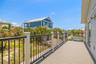 Private elevated deck ideal for outdoor dining, relaxing, and enjoying coastal breezes year-round.Generous outdoor deck space perfect for entertaining