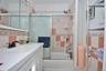 Full Bath featuring a bathtub with shower