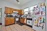 Kitchen has stainless stove
