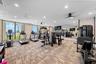 Fitness room facing amenities deck with views of the Bay