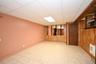Basement with tiled flooring.