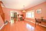 Dining room featuring pre-engineered hardwood.