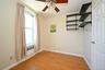 Second bedroom with pre-engineered hardwood flooring.