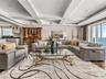 There is so much room for entertaining... And also, this is a great spot for communing with friends. And with the media room separate, you can have th