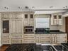 The Sub-Zero wine cooler has two refrigeration drawers and dual temp settings for wine.