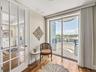 This is another unique feature of Unit 400. The eastern-most area is separated from the hallway via French doors.