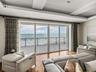 The warm gulf waters lap the edges of the pristine white sand. Since this photo was taken, new slider were added here and in the primary bedroom at a 