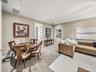 All media rooms must have carpet with a thick insulating pad for absorbing sound. The door to the left leads to a full bathroom, which also services t