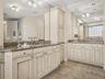 Natural light and the warm tones make this bathroom very relaxing!