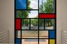 Mondrian-inspired window. It's a centerpiece of the threshold. Back terrace.