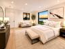 Virtually StagedViews of the Saddle Rock Waterfront and the bridge are visible from the Primary Bedroom.