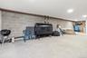 Walk-out basement with door leading to the backyard and lake