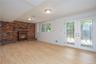 Brick fireplace and beautiful french doors