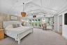 Priamry Suite with balcony overlooking pool area