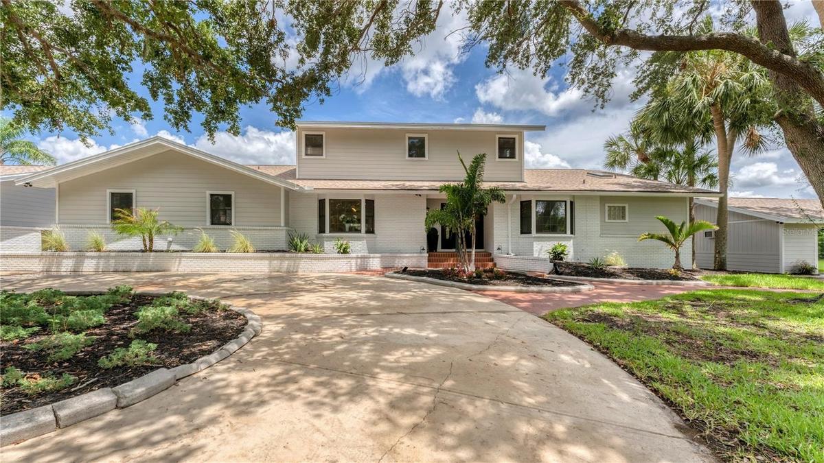 Circle driveway into front of 2 story home