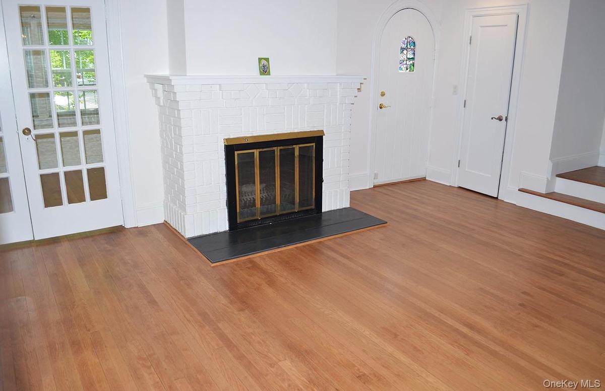 Living room with fireplace & hardwood floors