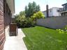 Sun filled, landscaped  back yard
