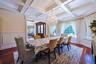Coffered ceiling featuring a crystal chandelier