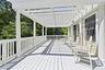 French Doors From Kitchen to Outside Deck with New Pergola