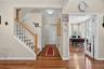 Main level hall and stairs to bedrooms