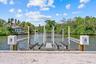 Electric lift for 2 jet skis or kayaks; ladder into Canal and additional boat docking space with tie ups for guests.