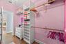 2 of 2 primary walk-in closets
