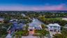Situated on over a third of an acre on the "Big Bend" of Siesta Key's Grand Canal with a stunning vantage point down its widest stretch.