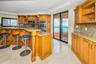 Cucina Features an Interior Ambiance Custom Cabinetry, Granite Surfaces, Bar Height Peninsula,Frigidaire Professional Series Stainless Appliances, Pol