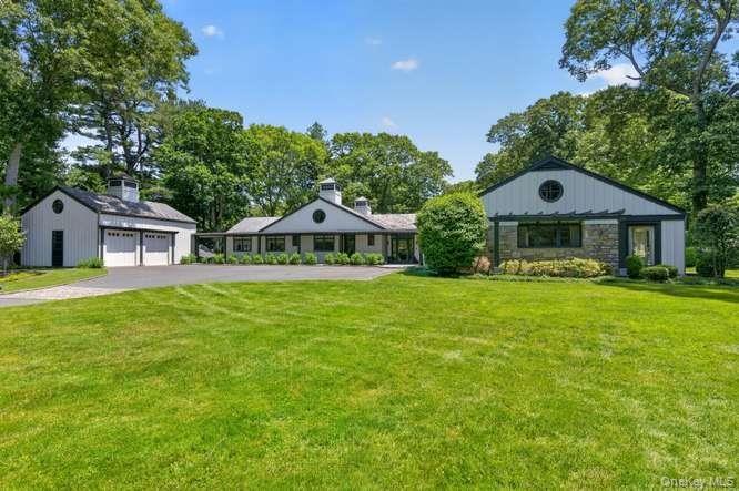 Private gated drive leading to the front of the home.
