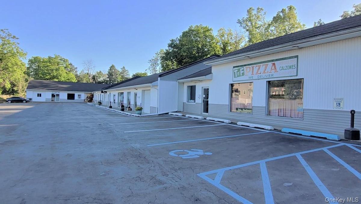 TnF Pizza anchors this plaza on the right