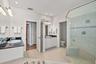Primary bath with two separate vanities.