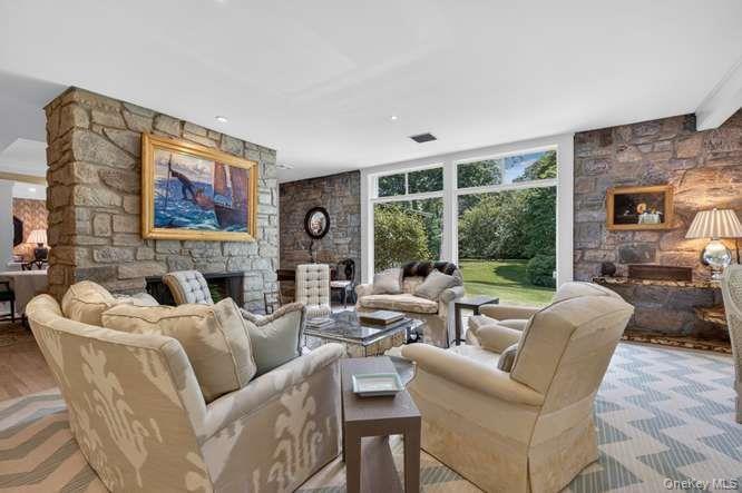 Living room with wood burning fireplace
