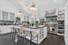 Large Island with stools to enjoy chatting with the cook or enjoying a meal.