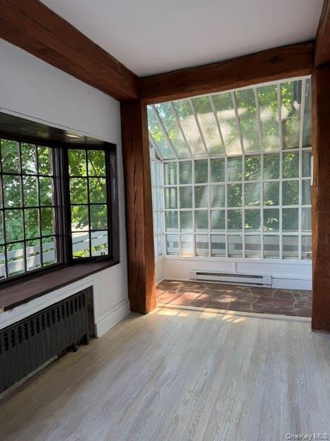 Sunroom faces bay window. Great views any time of year