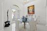 Formal dining space with abundant light. 1st hall leads to Beds 3 & 4, laundry and 3 car garage access