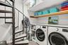 laundry and stairs to storage area